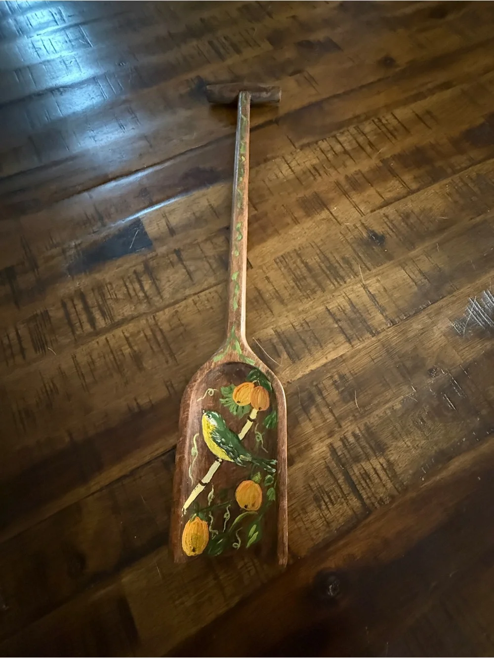 Hand-Painted Wooden Decorative Spoon with Green and Yellow Bird Design